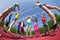 Fisheye view of teens playing volleyball outside