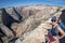 Fisheye wide angle view of the Zion National Park Observation Point Trail in Utah, with a woman hiker on the trail