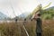 Fishing adventures. Angler with a throwing stick for boilies