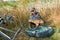 Fishing adventures, carp fishing. Mirror carp. Fisherman with a big carp