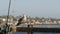 Fishing angling tackle or gear on pier. California USA. Sea ocean seagull bird, rod or spinning.