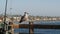 Fishing angling tackle or gear on pier. California USA. Sea ocean seagull bird, rod or spinning.