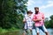 Fishing as holiday. Happy fishermen in water. Slightly older. Nice day for fishing. Men relaxing nature background