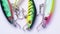 fishing baubles revolve close-up. artificial bait for kids