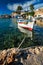 Fishing boars in harbour in fishing village of Mandrakia, Milos island, Greece