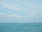 Fishing boat in blue sea with clouds sky background in Thailand. Relaxing moments in summer seasons travel.