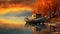 fishing boat close to the shore with autumn colors and orange sunset