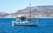 Fishing boat colorful moored at open sea, Ios island Cyclades, Greece