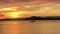 Fishing boat at dawn moves along the sea, bright sunrise over the sea and islands ,Lombok, Indonesia, south Gili islands