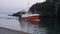 Fishing boat entering the harbour at high tide