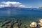 Fishing boat and fish farm, view from Albanian coast to Corfu, Greece. Beautiful Ionian sea landscape