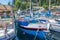 Fishing boat for a fishingtrip and other boats in the port of Kouloura in Corfu, Greece