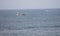 Fishing Boat and group of people fishing out at sea in La Jolla, Californa