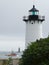 Fishing Boat Guided Between Lighthouses