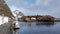 Fishing boat in Hamnoy harbour at Reinefjorden on the Lofoten in Norway in winter