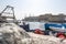 Fishing boat in the harbor next to the old town of Gallipoli, Apulia, Italy