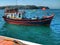 Fishing boat leaving harbor of Quang Ngai, Vietnam