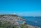 Fishing boat leaving Mousehole harbour on a beautiful summer day