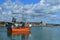 Fishing Boat leaving Newlyn Harbour Cornwall