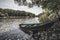 Fishing boat left on the bank of the steppe river