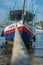 Fishing boat moored at the edge of the Ribeira waterfront in Salvador, Brazil