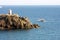 Fishing boat near the lighthouse of Piombino, Italy