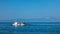 Fishing boat with nests at sea in front of mountain Athos