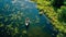 Fishing from a boat in the open ocean, a hobby of catching fish. Beautiful seascape, aerial view. travel banner.