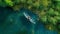 Fishing from a boat in the open ocean, a hobby of catching fish. Beautiful seascape, aerial view. travel banner.