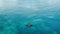 Fishing from a boat in the open ocean, a hobby of catching fish. Beautiful seascape, aerial view. travel banner.