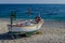 Fishing boat pulled ashore on the beach