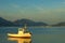 Fishing boat reflecting on sea