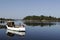 Fishing boat reflecting on sea