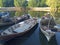 The fishing boat rests next to the riverside house in the evening.  Tangerang Indonesia, July 14 2023.