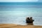 Fishing boat on the rocks