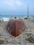 Fishing boat on sandy beach at sunset in Pineda de Mar, Spain