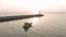 Fishing Boat and sea Pier lighthouse sunset time in Asia