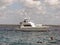 Fishing boat and snorkeling on the coral reef