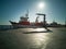 Fishing boat in a Spanish harbor. Front view backlight maritime scene