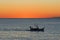 Fishing boat at the sunset