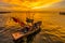 Fishing boat with sunset at Laem Tan Bangsan Beach, Sriracha, Chonburi ,Thailand