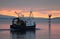 Fishing boat at sunset, Oban Bay, Scotland.