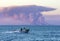 A fishing boat travels on the Indian Ocean.