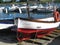 Fishing boats aground in the calm canal of the little harbor of Pra