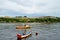 Fishing boats at anchorage near the Malecon waterfront, view of the sea strait, walls of the fortress of San Carlos de la CabaniaC