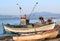 Fishing boats at the beach in Greece. Greek summer tradition