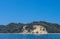 Fishing boats and a catamaran near beach by Morton Island - a sand island off the coast of Queensland Australia - with very blue w