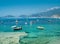 Fishing boats, clear blue sea and mountains