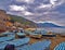 Fishing boats in cloudy weather on the beach of Laigueglia, Savona, Liguria, Ligurian Sea, Italy