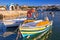 Fishing boats on the coastline of Kato Galatas town on Crete, Greece